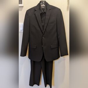 Calvin Klein suit and shirt. Great for school music, graduation!